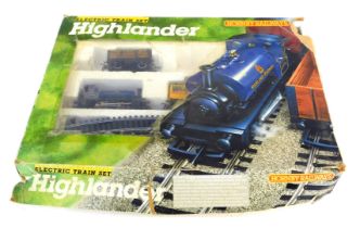 A partial Hornby Highlander electric train set, boxed.