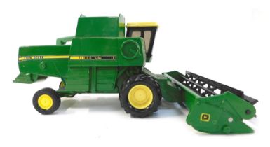 An Ertl John Deere turbo combine harvester.