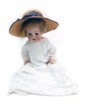 A Simon & Halbig German porcelain bisque headed doll, with brown roll eyes and teeth, blonde hair w