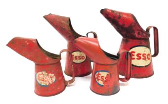 A group of Esso oil pouring cans. (4)