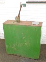 A vintage Agricastrol oil dispenser tank.