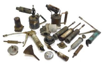 A group of oil grease guns, hub caps, pressure gauges, shot blasting iron, etc. (1 box)