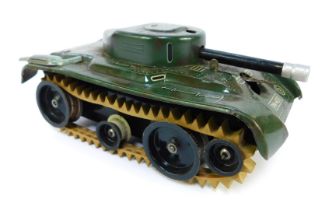 A 1960s tinplate model tank, 17cm long.