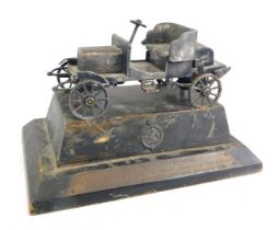 A steel scale model of a 1906 Rover Motor Car, made by the Girling Apprentices 1959, the stepped woo