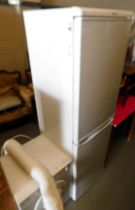 A Creda Simplicity T320VW tumble dryer and a Hotpoint RFA52P fridge freezer. This lot is to view and