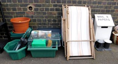 A quantity of plastic garden planters, a propagator, two deckchairs, two metal garden seats and a ma