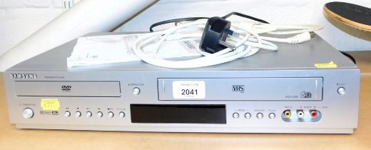 A Samsung Progressive Scan DVD/VHS player, model no. V5500.