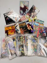 A quantity of Dark Horse comics titles include Star Wars and Batman, and various other items.