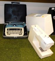 A Pfeff Hobby 1142 sewing machine, (boxed), and an Imperial typewriter in case.