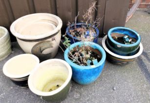 Eight ceramic garden planters.