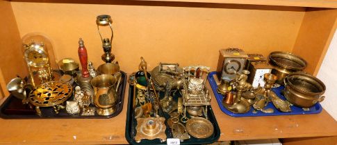 Brassware, to include clocks, candlesticks, bowls, fire irons, tankards, etc. (3 trays)