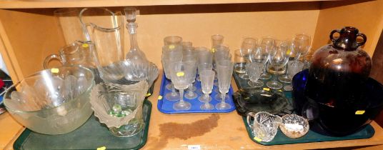 Glassware including a demi john, large blue glass bowl, large cut glass bowls, drinking glasses. (5