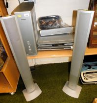 A Panasonic DVD model DVDS75 and High Quality Full Digitial amplifier with tower speakers and contro