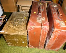 Two mid century pressed leather suitcases, together with an embossed brass coal box.