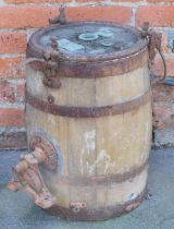 An early 20thC oak and cast iron bound butter churn, by Nathan of Chippenham, 52cm high.