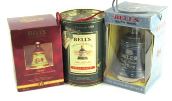 Three Bell's whisky decanters, for Christmas 1996, Royal Reserve 20 Years Old, and Christmas 1990, b