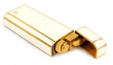 A Cartier of Paris enamel and gold plated cigarette lighter, serial number 1615608, 7cm high.