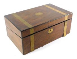 A 19thC mahogany writing box, with brass bound decoration, with a striped and shield, with a green b