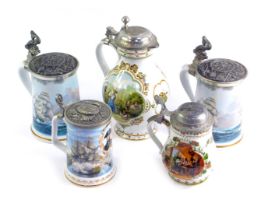 A small collection of beer steins, to include two Franklin porcelain steins with pewter lids, entitl