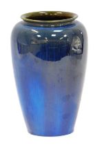 A Bourne Denby stoneware vase, of plain tapered oval form, with blue running glazes, 26cm high.