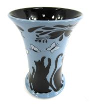 A Moorcroft vase, on a blue ground decorated with cats and butterflies, entitled Lucky Black Cat, de