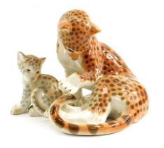 A Russian Lomonosov porcelain model of a seated leopard, 16.5cm high, and a model of a seated leopar