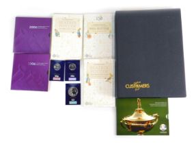 A group of collectors coins, comprising 2014 Rider Cup commemorative banknote, a United Kingdom fift