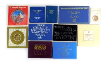 A group of assorted coin packs, comprising commemorating the Opening of Buckingham Place, 1977 and 1
