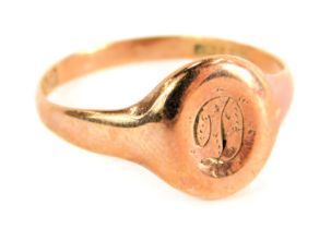 A 9ct rose gold signet ring, with circular panel inscribed D, ring size M½, 2.4g.