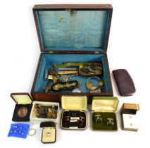 A 19thC mahogany and mother of pearl inlaid writing box, and contents of jewellery, coins, cufflinks