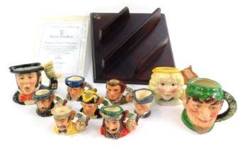A small collection of Royal Doulton miniature character jugs, including The Caroler, Elf, The Angel,