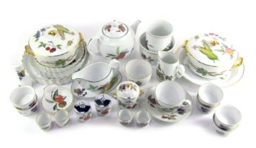 A Royal Worcester Evesham and Evesham Vale part tea and dinner service, to include to tureens and co