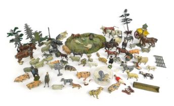 Various playworn lead farm animals and accessories, to include horses, sheep, geese, cows, turkeys,
