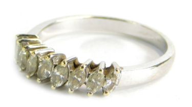 A diamond half hoop dress ring, set with nine marquise cut diamonds, each in claw setting, approx 0.