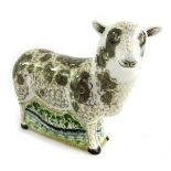 A Royal Crown Derby porcelain paperweight modelled as Jacob Sheep, gold stopper and red printed mark