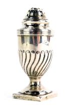 A Victorian silver pepper pot, with fluted body, on a square foot, Sheffield 1886, 1.46oz.
