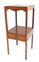 A George III mahogany washstand, with later square platform top, fitted drawer below, on slender cha