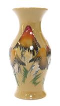 A Moorcroft pottery vase decorated in the Magic Toadstools pattern, of baluster form, impressed mark