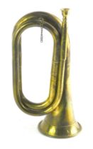A brass bugle, of plain design, with mouth piece, 28cm.