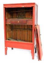 A Chinese red lacquer cabinet, with two doors enclosing drawers, etc., 182cm high, 113cm wide.