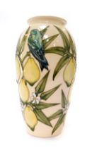 A Moorcroft pottery vase decorated in the Lemons with Bluebird pattern, designed by Sally Tuffin, im