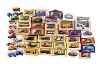 A group of diecast vehicles, to include Days Gone, Lledo, Mobil, etc. (1 box)