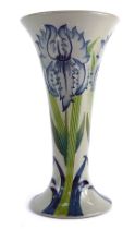 A Moorcroft pottery Florian ware vase, of inverted trumpet form, on a flared circular foot, decorate