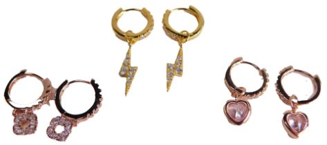 Three pairs of hoop earrings, each stone set, to include two rose gold coloured and a gold coloured