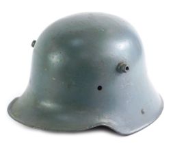 A World War Two German M18 pattern helmet, lined interior, 20cm high.