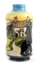 A Moorcroft pottery vase decorated in the Potter's Home pattern, of cylindrical waisted form, impres