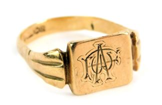 A 9ct gold signet ring, with rectangular panel bearing initials AD, with fanned three splay shoulder