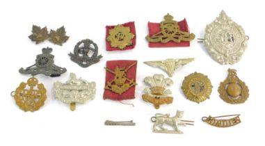 A group of cap and shoulder military badges, to include Argyle and Sutherland, oblique crown, RAFC,