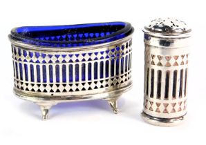 A George V silver pepper pot, with blue glass liner, and a later silver mustard, with blue glass lin