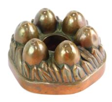 A Victorian copper jelly mould, 15cm diameter.